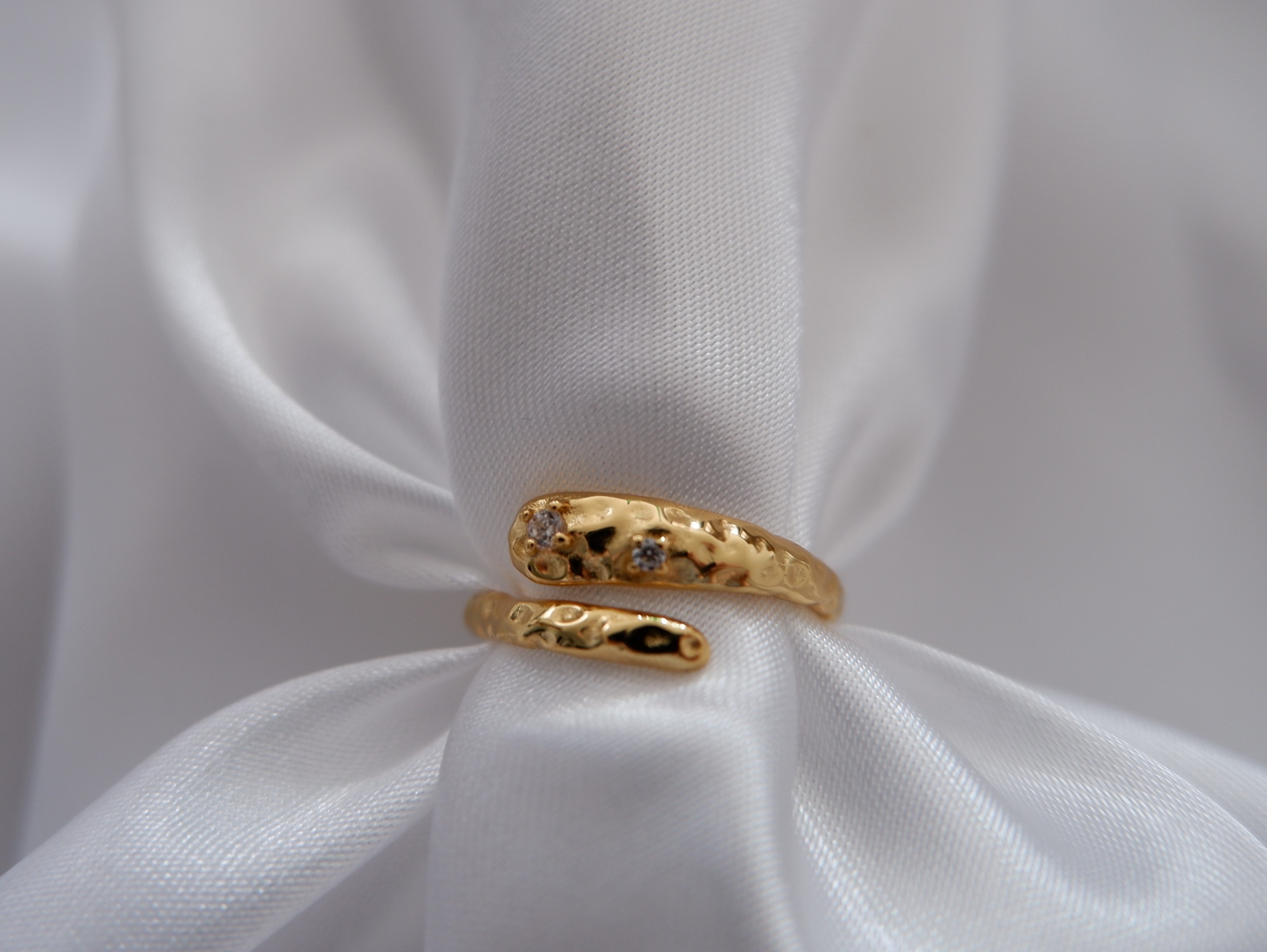 Embrace elegance with our gold-plated and silver ring, a chic accessory to enhance your ensemble from our captivating jewellery collection.