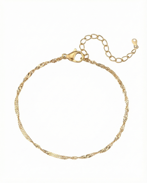 Gold bracelet on a white background