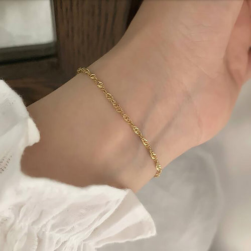 Embrace the beauty of our gold-plated and stainless steel bracelet, a shining gem in our exceptional jewellery collection.