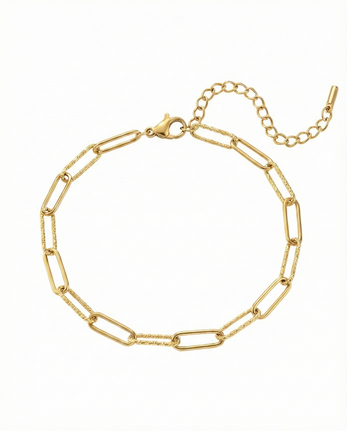 Gold chain bracelet on a white background