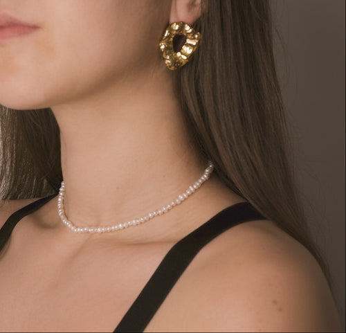 Elegance meets durability with gold-plated and stainless steel earrings, a versatile addition to your style from our curated jewellery collection.