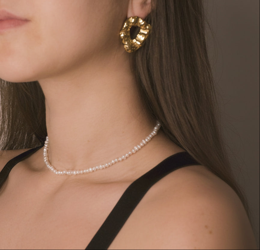 Elegance meets durability with gold-plated and stainless steel earrings, a versatile addition to your style from our curated jewellery collection.