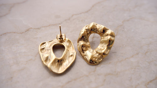 Radiate sophistication with gold-plated and stainless steel earrings, a timeless accent to your ensemble from our exceptional jewellery collection.