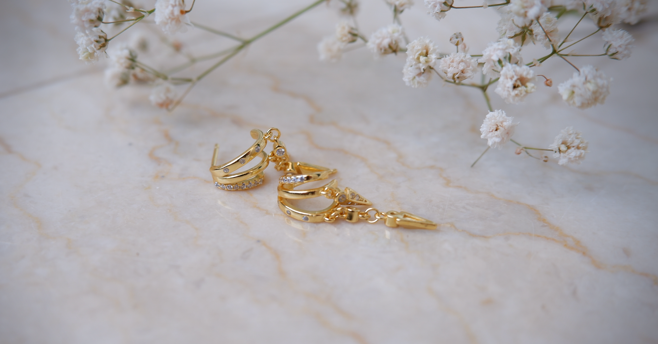 Charm and versatility in gold-plated and silver earrings, a perfect complement to your style from our curated jewellery collection. 