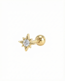 Gold star-shaped earring with a clear gemstone on a white background